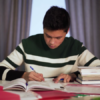 Focused Asian Student Studying At Table Stock Footage SBV-338164778 ...