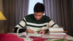 Focused Asian Student Studying At Table Stock Footage SBV-338164778 ...